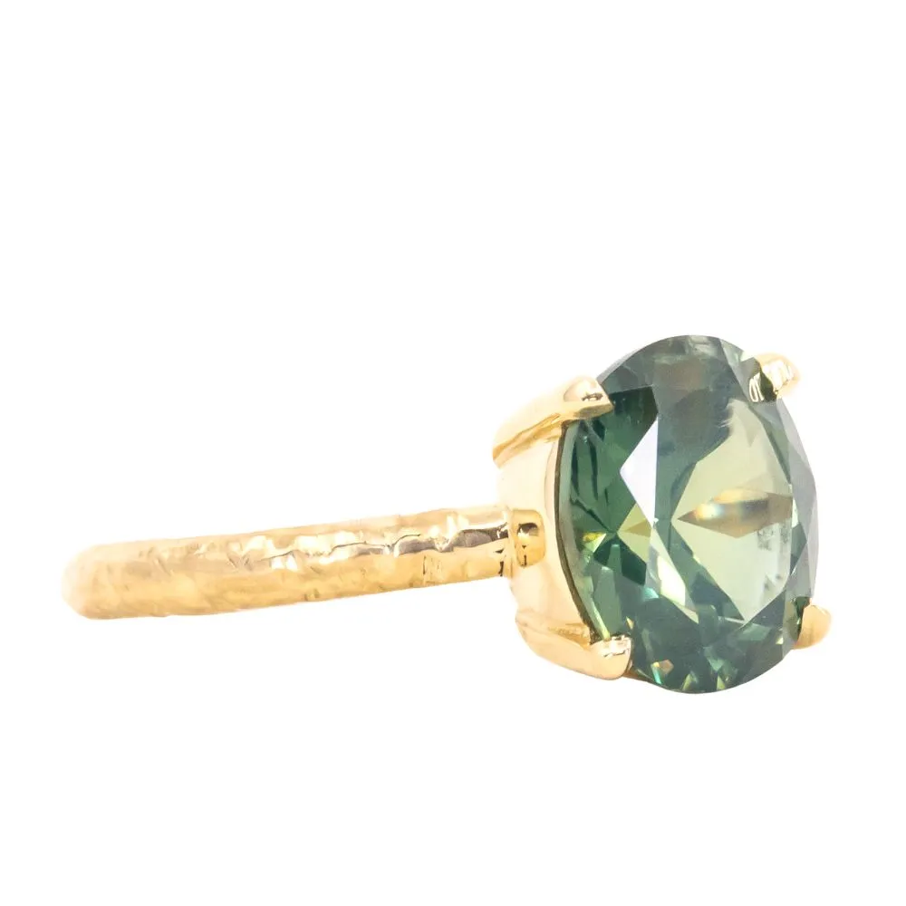 2.77ct Oval Silky Nigerian Sapphire Low Profile 4 Prong Evergreen Solitaire in 18k Yellow Gold