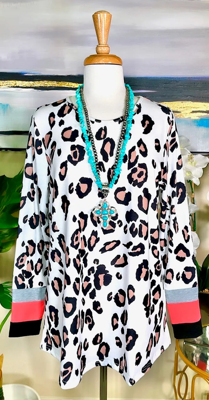 White Leopard long sleeve top with coral cuff